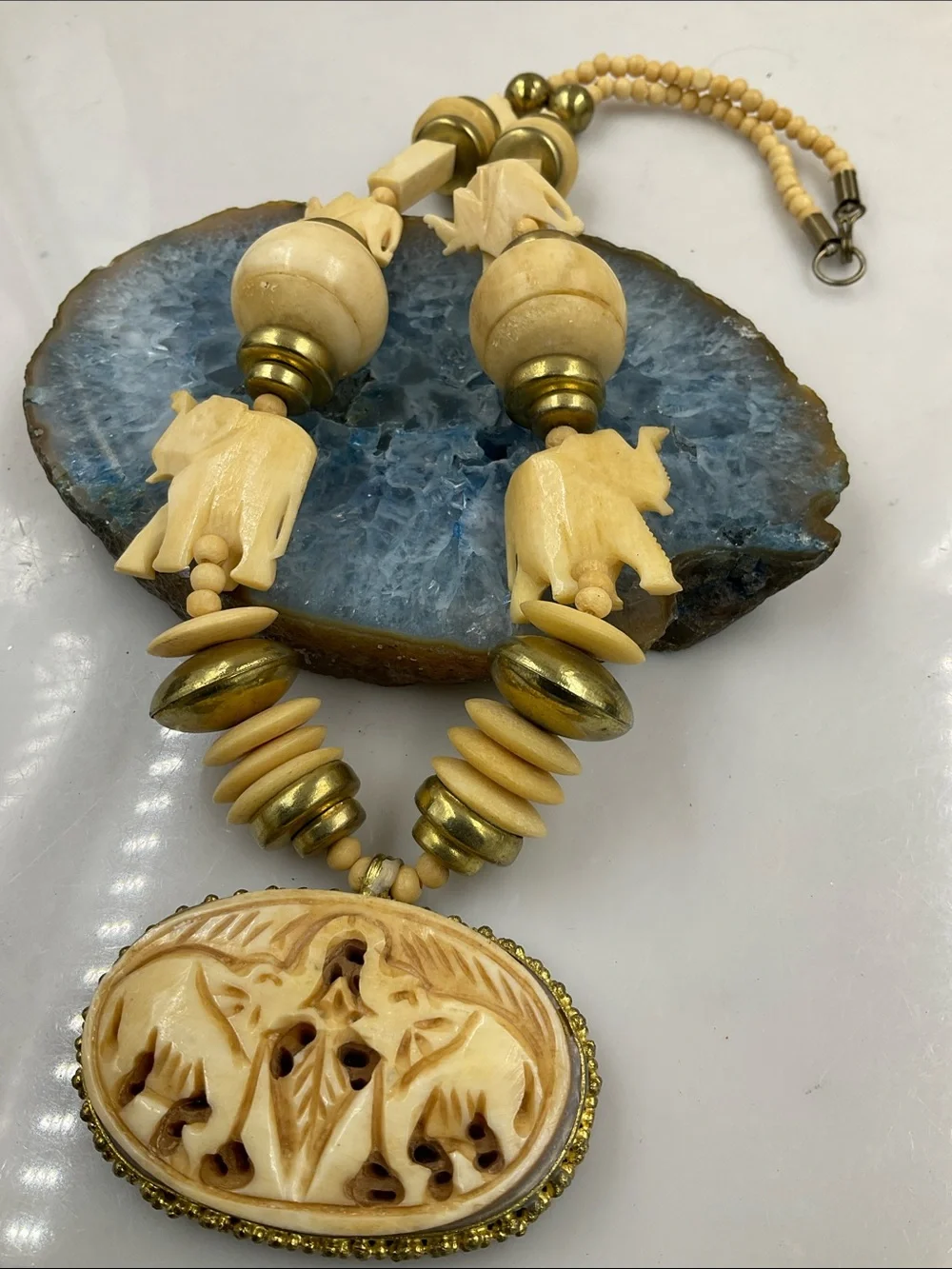 Vintage 1960 Gold Tone Hand Carved Bone Elephant Pendant Statement Necklace
